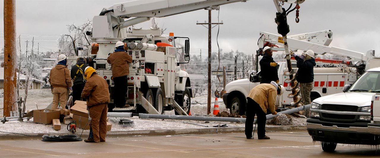 Contractors cleaning up after storm