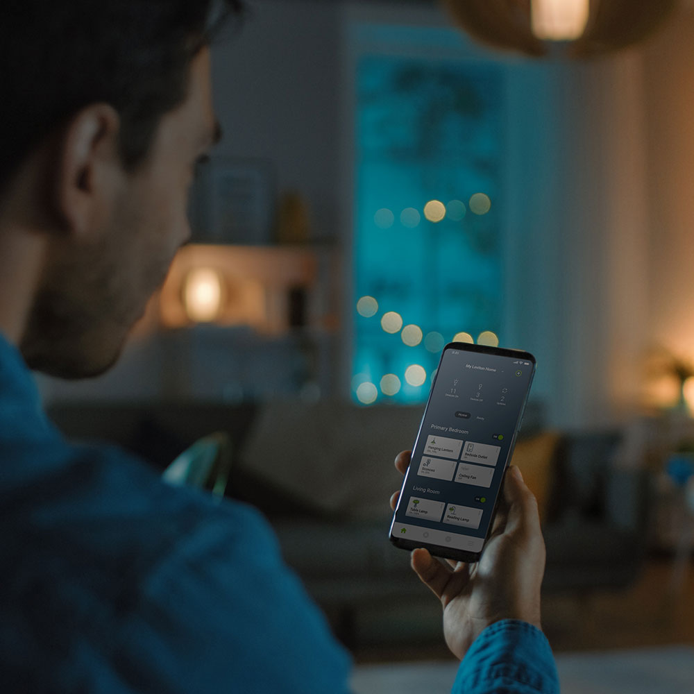 man using smart home app