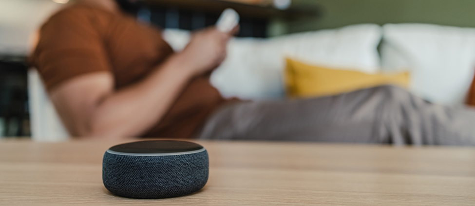 Man controlling voice control on smart device