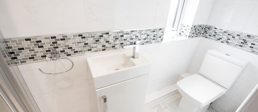 Overhead View of Bathroom with wall tiles
