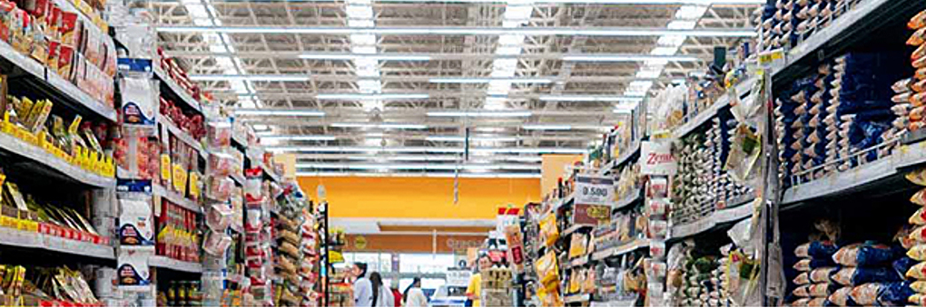 Making the Case for Lighting Control and LED Lighting Solutions in Grocery Applications - Grocery store aisle