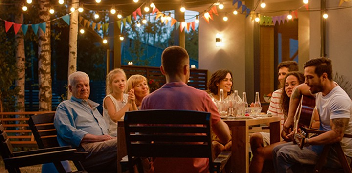 Family sitting around table talking